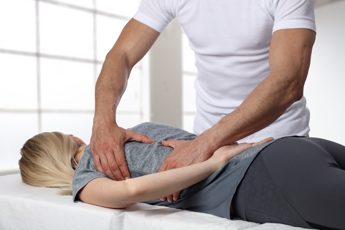 A patient getting a chiropractic adjustment